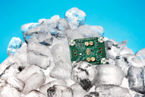 Control electronics developed to withstand extreme cold, artistically shown on a pile of ice. Image credit: Bas Czerwinski for QuTech.
